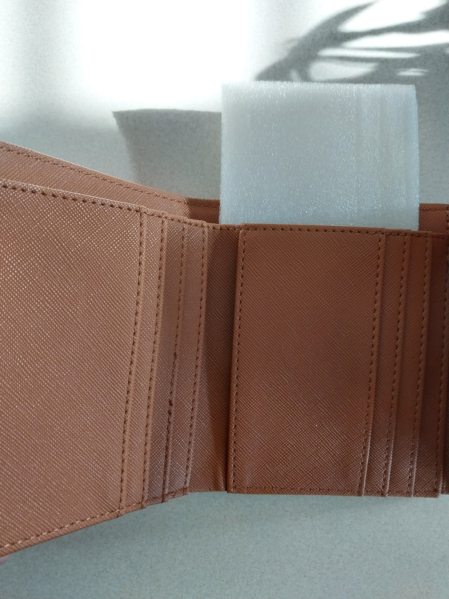 Tan wallet