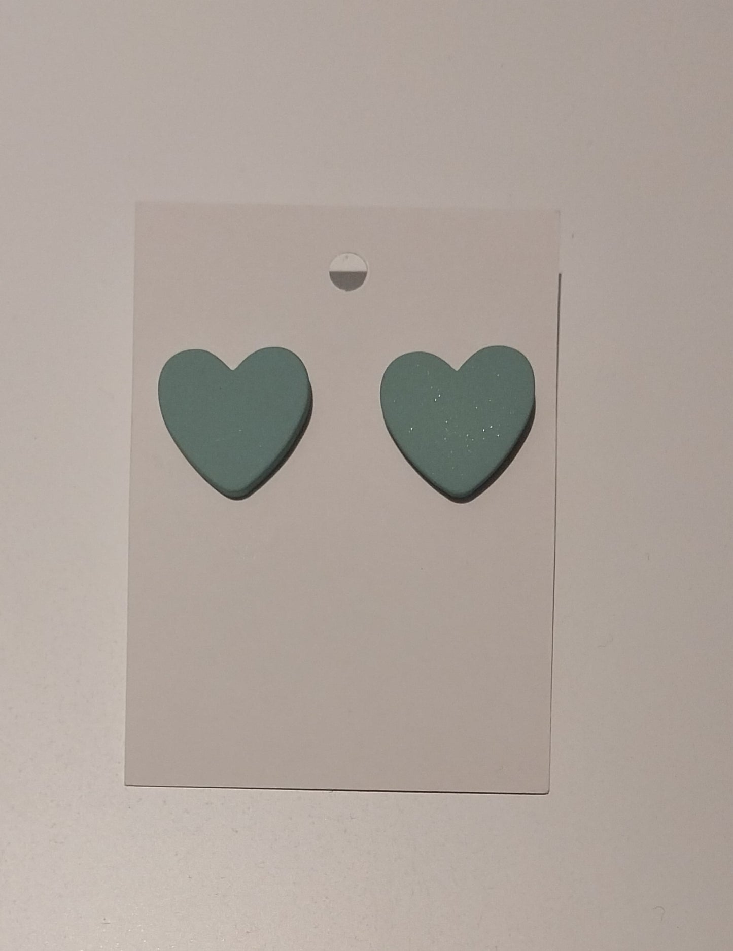 Teal heart studs