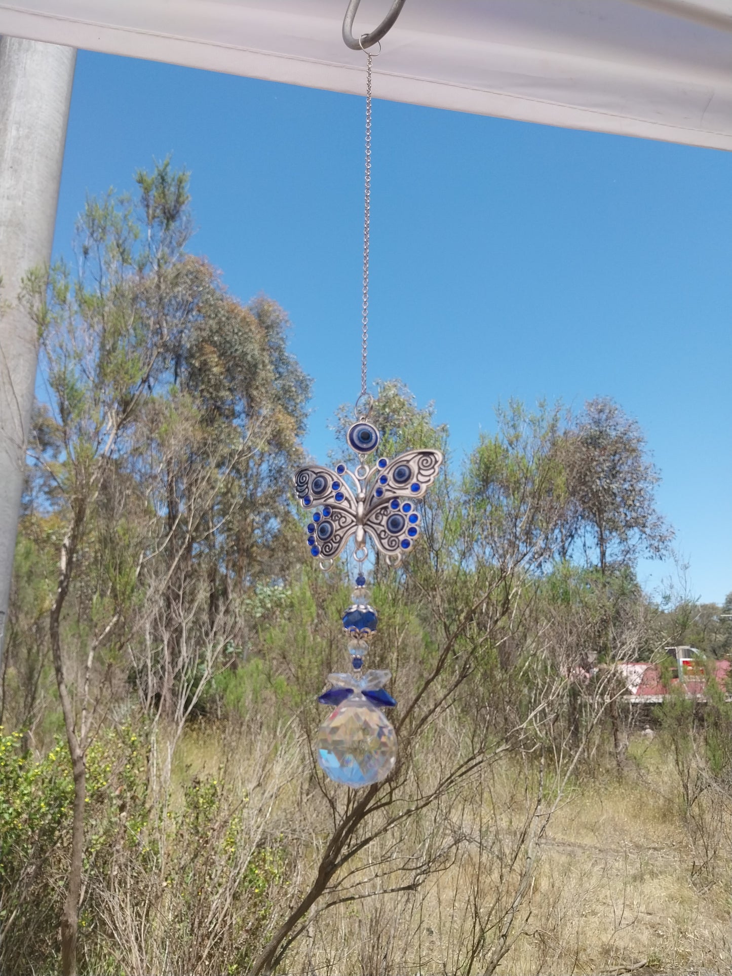 Evil eye wind crystal hanging